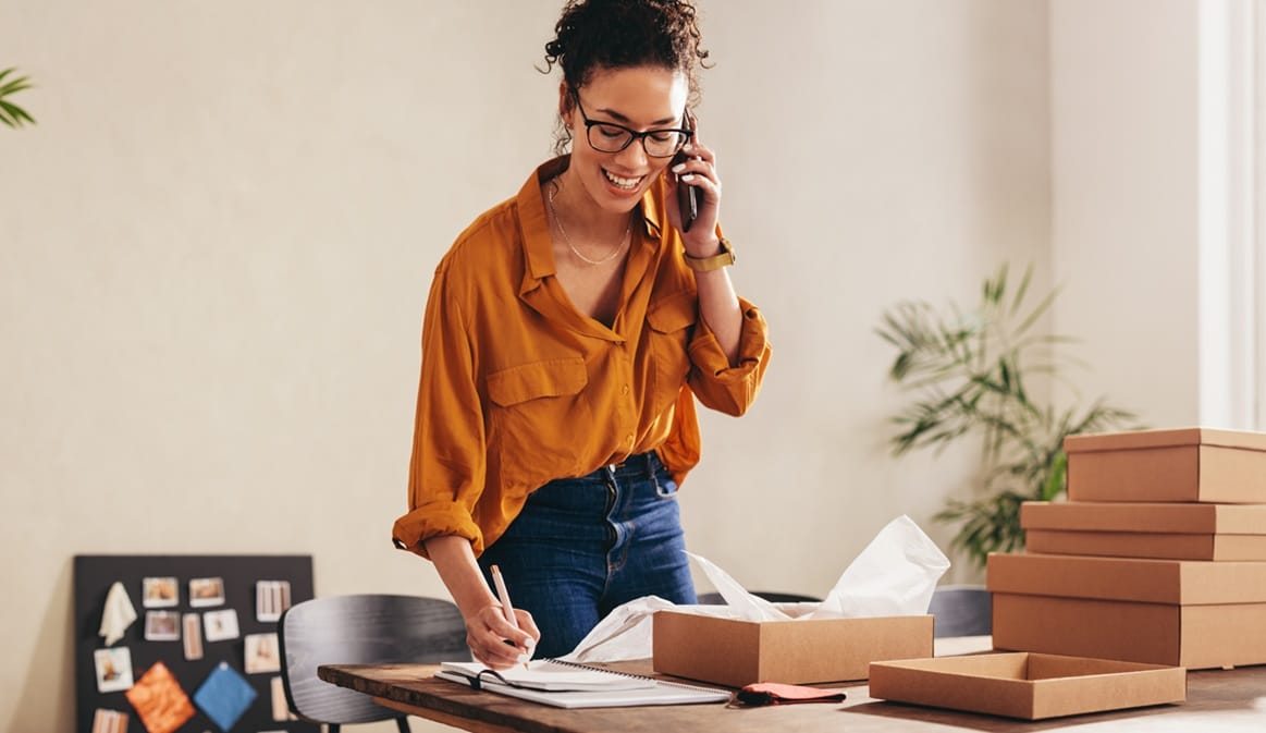 business owner confirming the order on phone